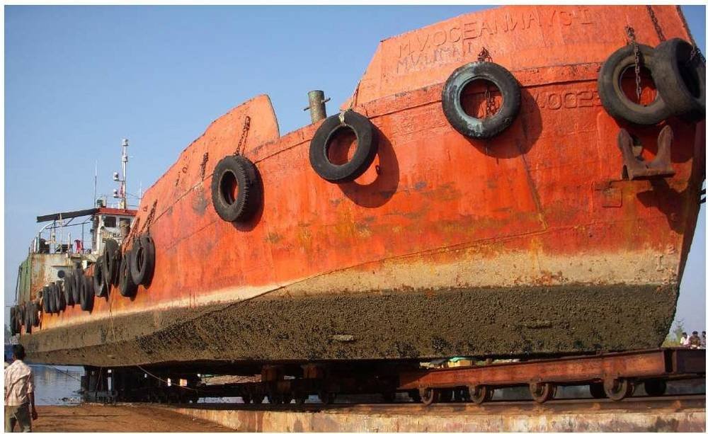 Dredger support vessel in dry dock