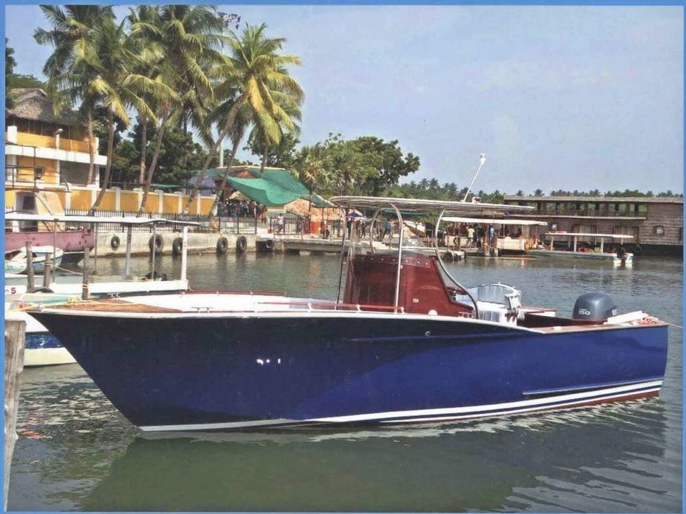 Passenger boat moored alongside in the Puducherry backwaters